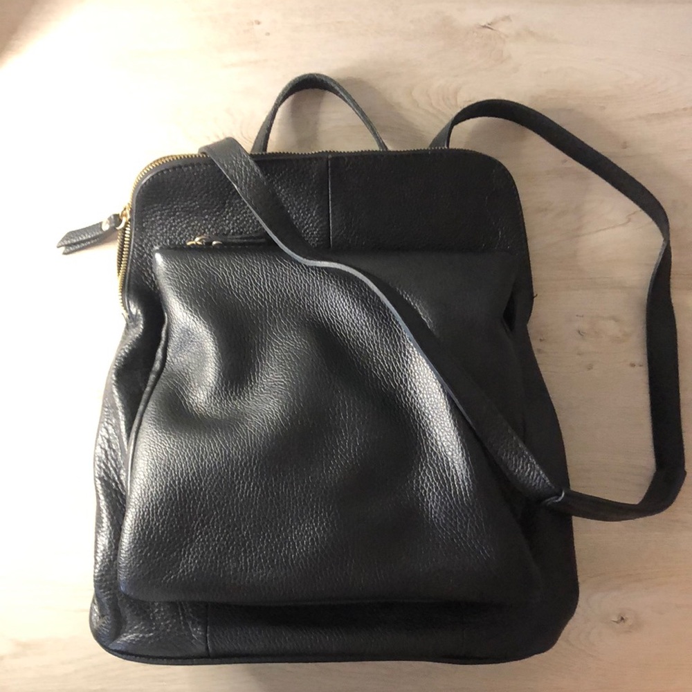 Back pack / cross body / shoulder purse